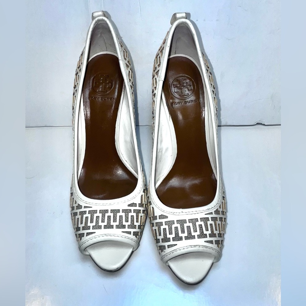Tory Burch "Regan" High Heel Pump.
Natural Wood Heel & Lattice Pattern Logo.